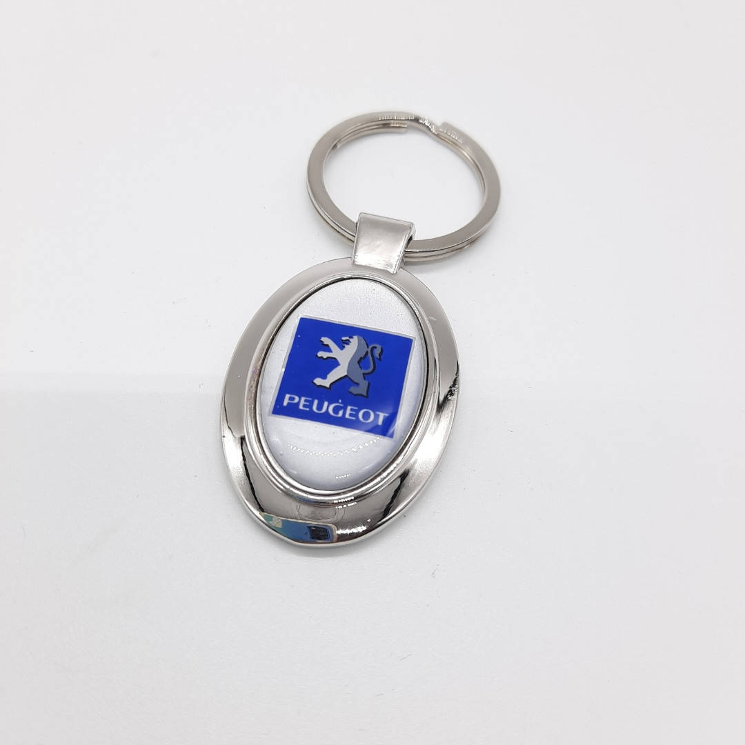 

Брелок моне Peugeot