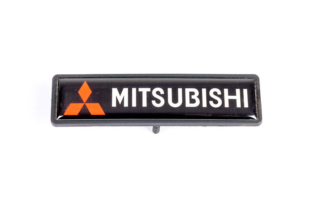 

Mitsubishi Шильдик для ковриков (1шт)