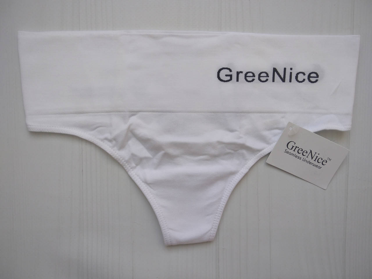 

Трусики стринги Greenice бесшовные широкий пояс скорпион белый L\XL 2144