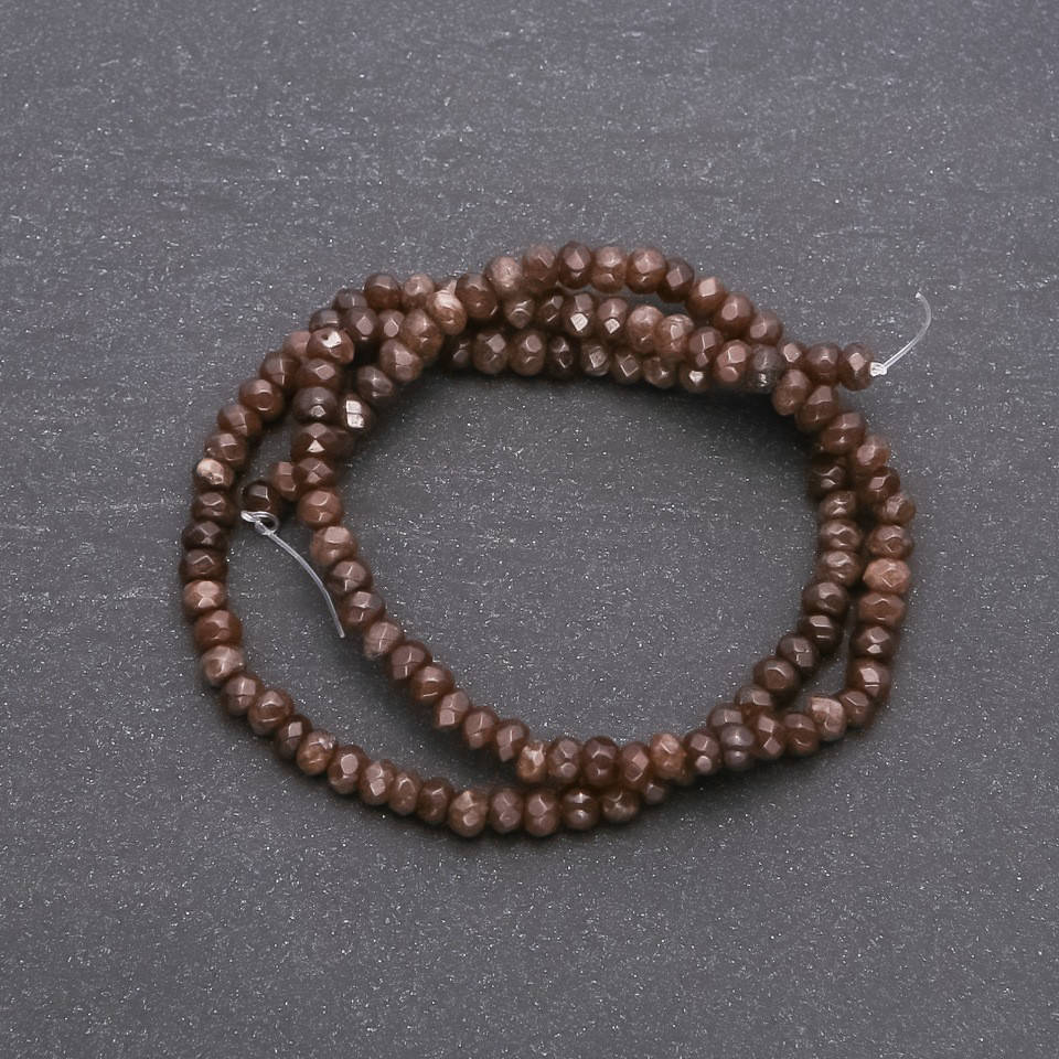 

Бусины из натурального камня "Раухтопаз" (имитация) граненный рондель d-4х3мм нитка L-38см