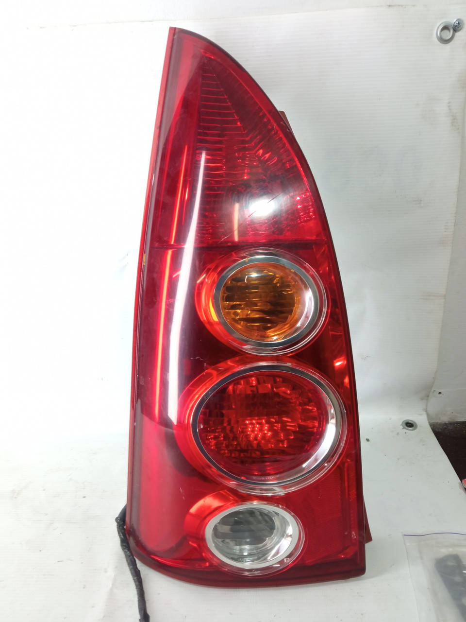 

Фонарь стоп задний левый Mazda Premacy 2001-2005г.в. рестайл