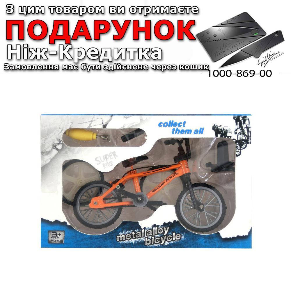 

Фингербайк в подарочной упаковке с запасными колесами Оранжевый