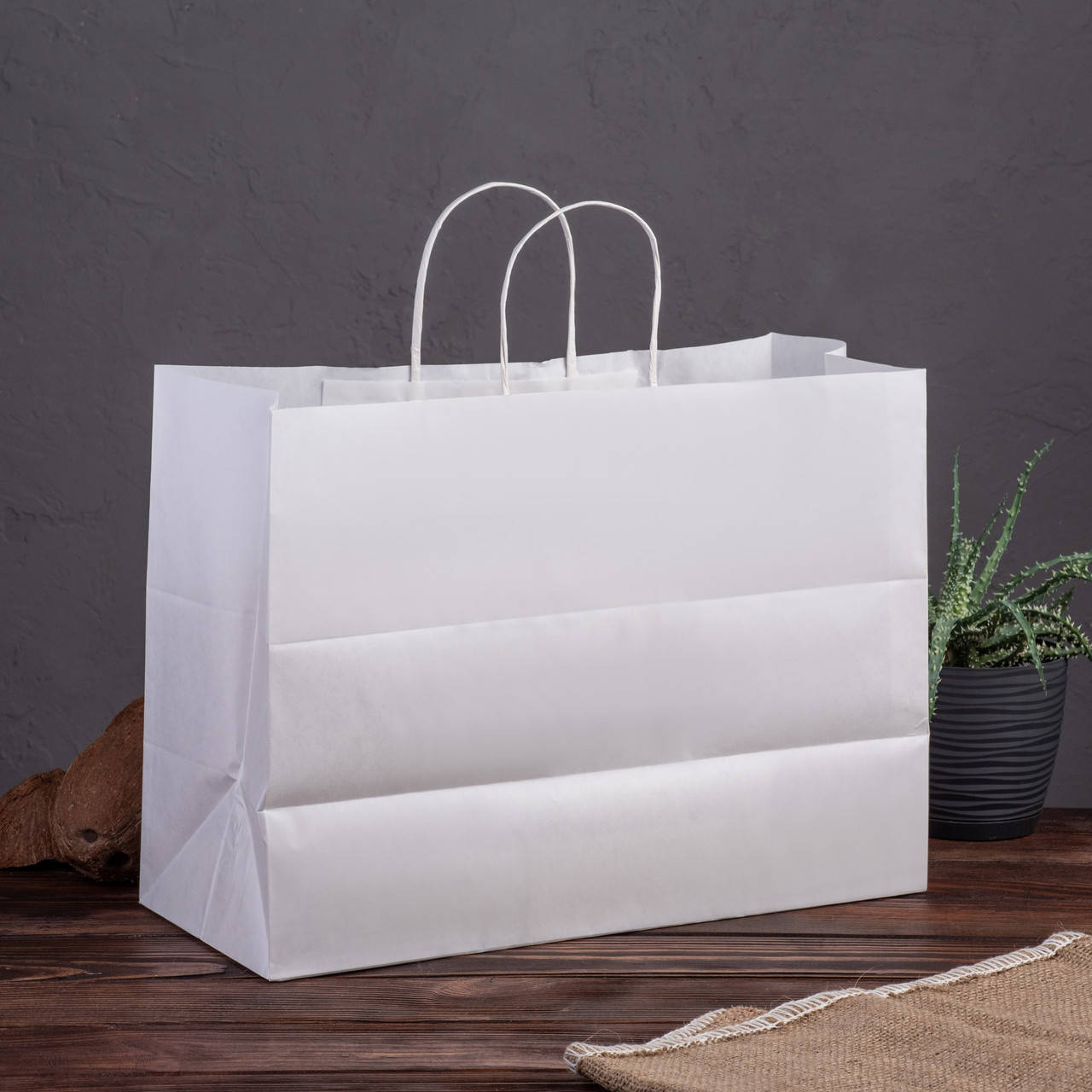 

Крафт пакет білий горизонтальний 380*170*280 мм з посиленим дном, Белый