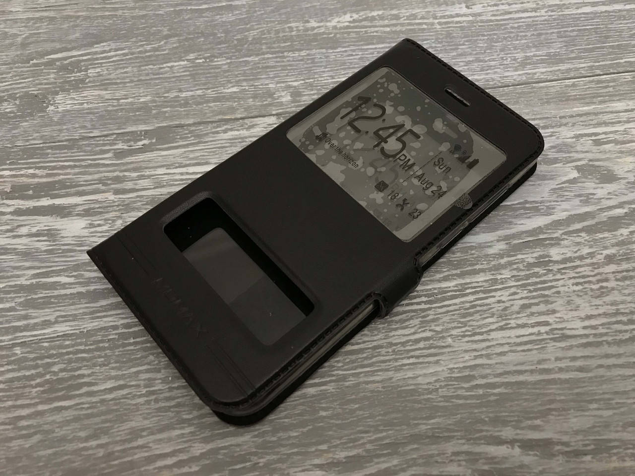

Кожаный чехол книжка Momax для Honor 9 (3 цвета) черный