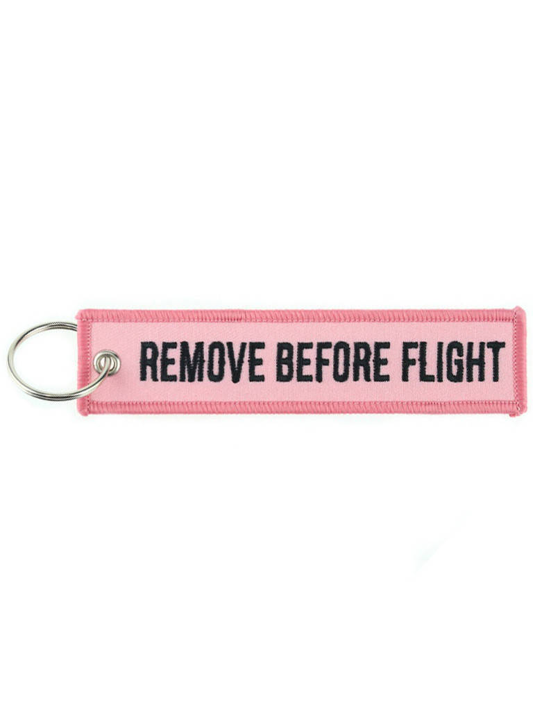 

Брелок бирка Remove Before Flight Розовый