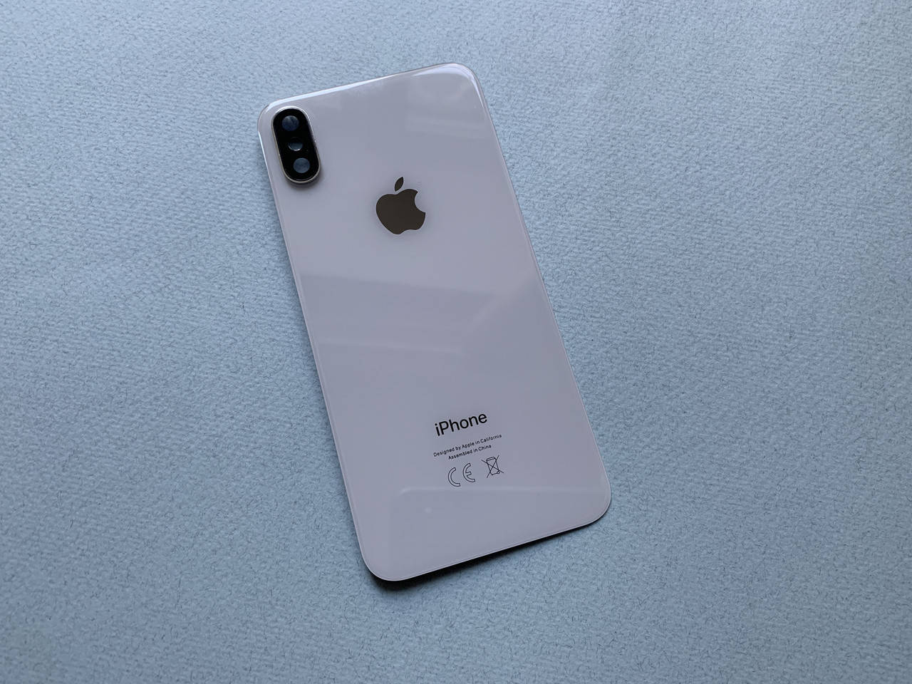 

Задняя крышка для iPhone Xs на замену Silver со стеклом камеры, Белый