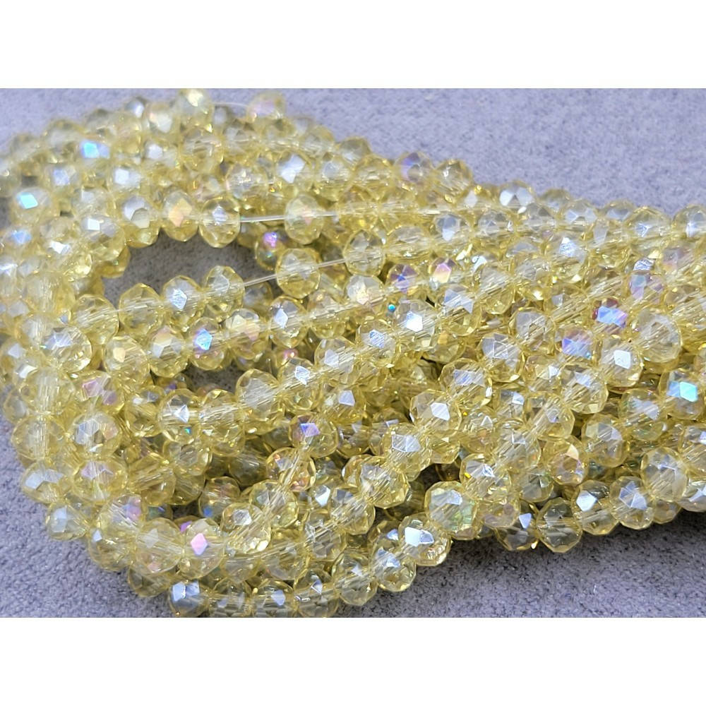 

Хрустальные бусины(рондель). Размер 4 мм. В упаковке прим.140 шт. цвет - желтый бледный с АБ