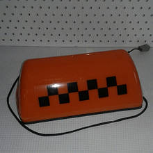 Знак фішка шашка таксі жовтогарячий