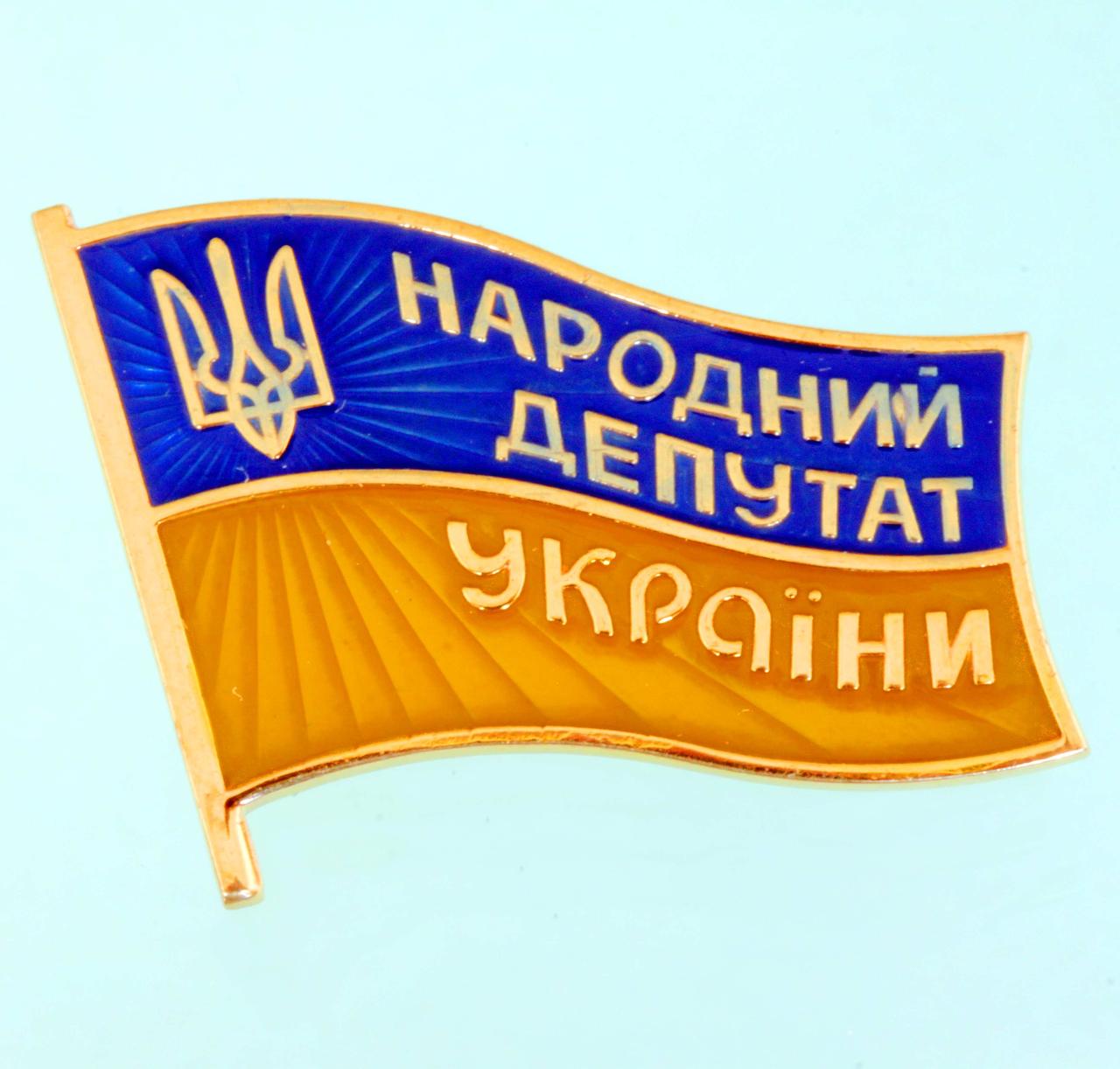 Срібний знак з позолотою