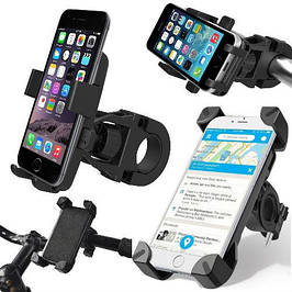 Велотримачі