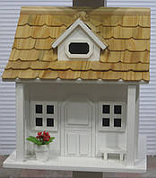 Шкворечник, садовий будиночок для птахів.