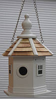 Шкворечник, садовий будиночок для птахів.