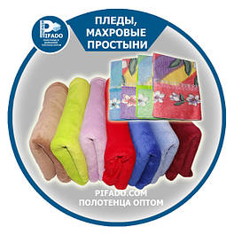 Пледи, покривала і простирадла