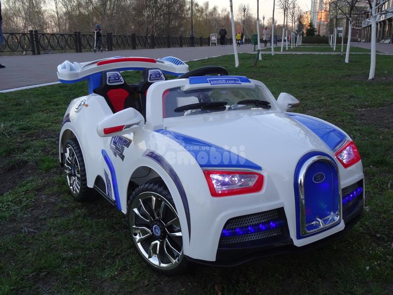 Дитячий електромобіль Bugatti Veyron 12 V 10 AH, два мотори, шкіряне сидіння, двері світяться, MP3