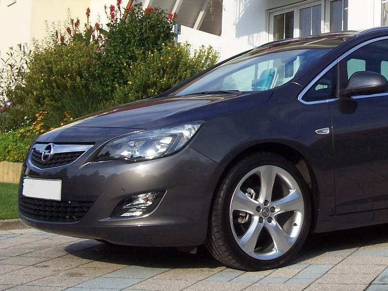 Губа Opel Astra J тюнінг спідниця переднього бампера стиль OPC