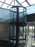 Гнутые ламинированные стекла для лифта