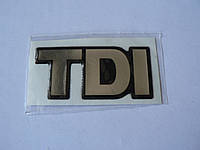 Наклейка s силиконовая надпись TDI 65х30х1,2мм ТДИ черный фон серебристая надпись на авто