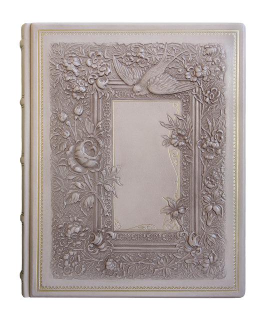 Фотоальбом в шкіряній палітурці з об'ємним тисненням на шкірі з дизайнерськими листами "Ластівка", фото 1