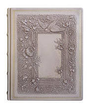 Фотоальбом в шкіряній палітурці з об'ємним тисненням на шкірі з дизайнерськими листами "Ластівка"