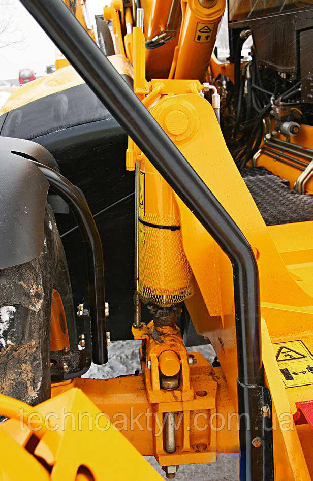 Механізм вирівнювання рами