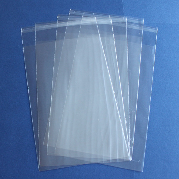 Упаковка з целофану на ліпучці  32х45см,  від 100 шт.