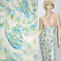 Шифон орарі молочний в блакитні квіти ш.140