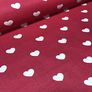 Бавовняна тканина польська серця великі білі на червоному (0172)