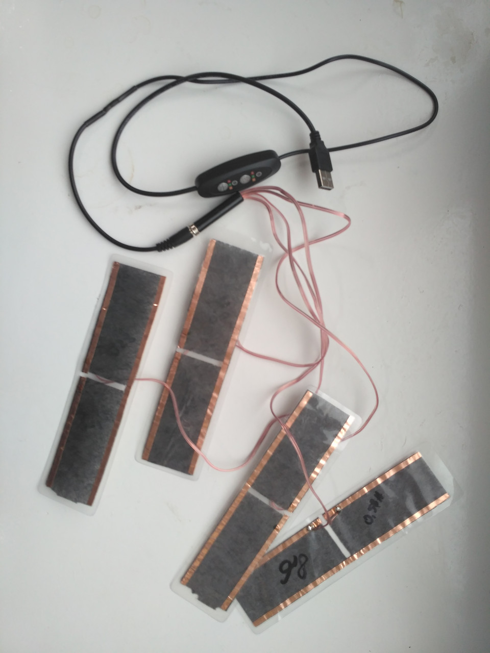 Нагрівники для штанів, термобель, стелек, жилет, куртки 5V/2A 50C Комплект 4шт.