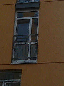 Oкно Комфорт Таун на балкон 1140х2610 REHAU Euro-Design 70 з енергоефективним склопакетом