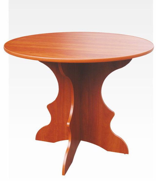 На фото изображен стол обеденный круглой формы