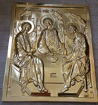 Золочення сусальним золотом різьбленої ікони Святої Трійці.