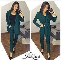 Костюми жіночі