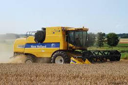 Комбайн зернозбиральний NEW HOLLAND AND CSX 7060