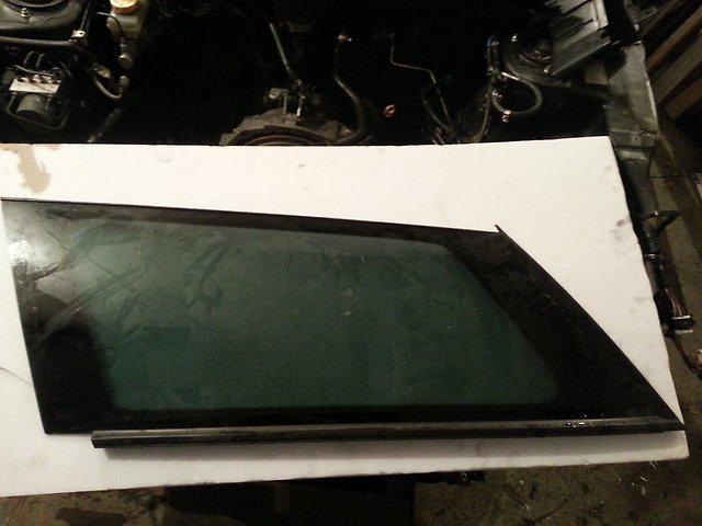 Скло кузове ліве Subaru Outback, Legacy B13 03-08, 65210AG210