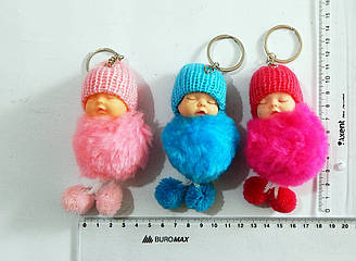 Брелок немовля з пампоном пушком