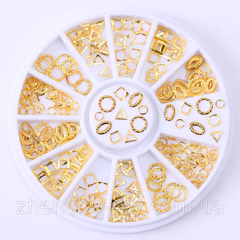 Металеві прикраси для нігтів у карусельці