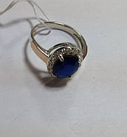 Кольцо из серебра Мирате с синим камнем и золотом