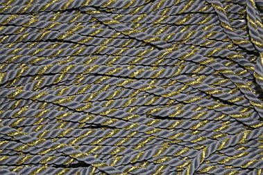 Канат декоративний 6мм поліестер світло-сірий+золото моток 50м