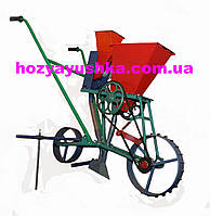 Сеялка з бункером для добрив