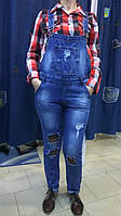 Женский джинсовый комбинезон со вставками сетка