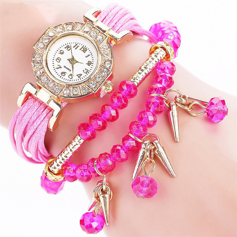 Жіночі годинники браслет з рожевим ремінцем