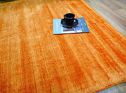 Однотонний тканий вручну оранжевий килим із бамбукового шовку