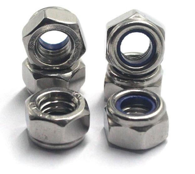 Гайка нержавіюча М14 DIN 985, ISO 10511 низька самоконтрящаяся з нейлоновим кільцем