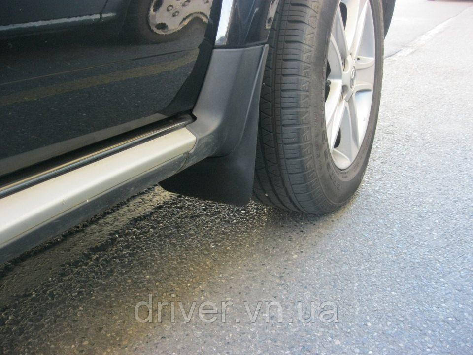 Бризковики Renault Duster (10-) оригінальні передні \ 2 шт