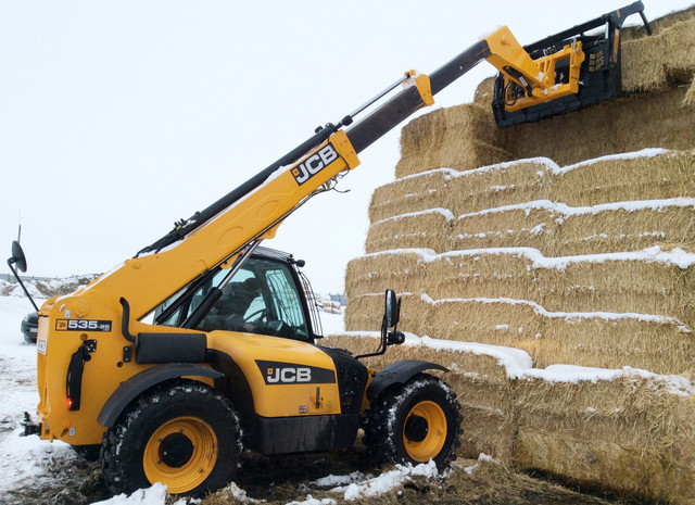 Телескопічний навантажувач JCB Фото телескопічного навантажувача JCB