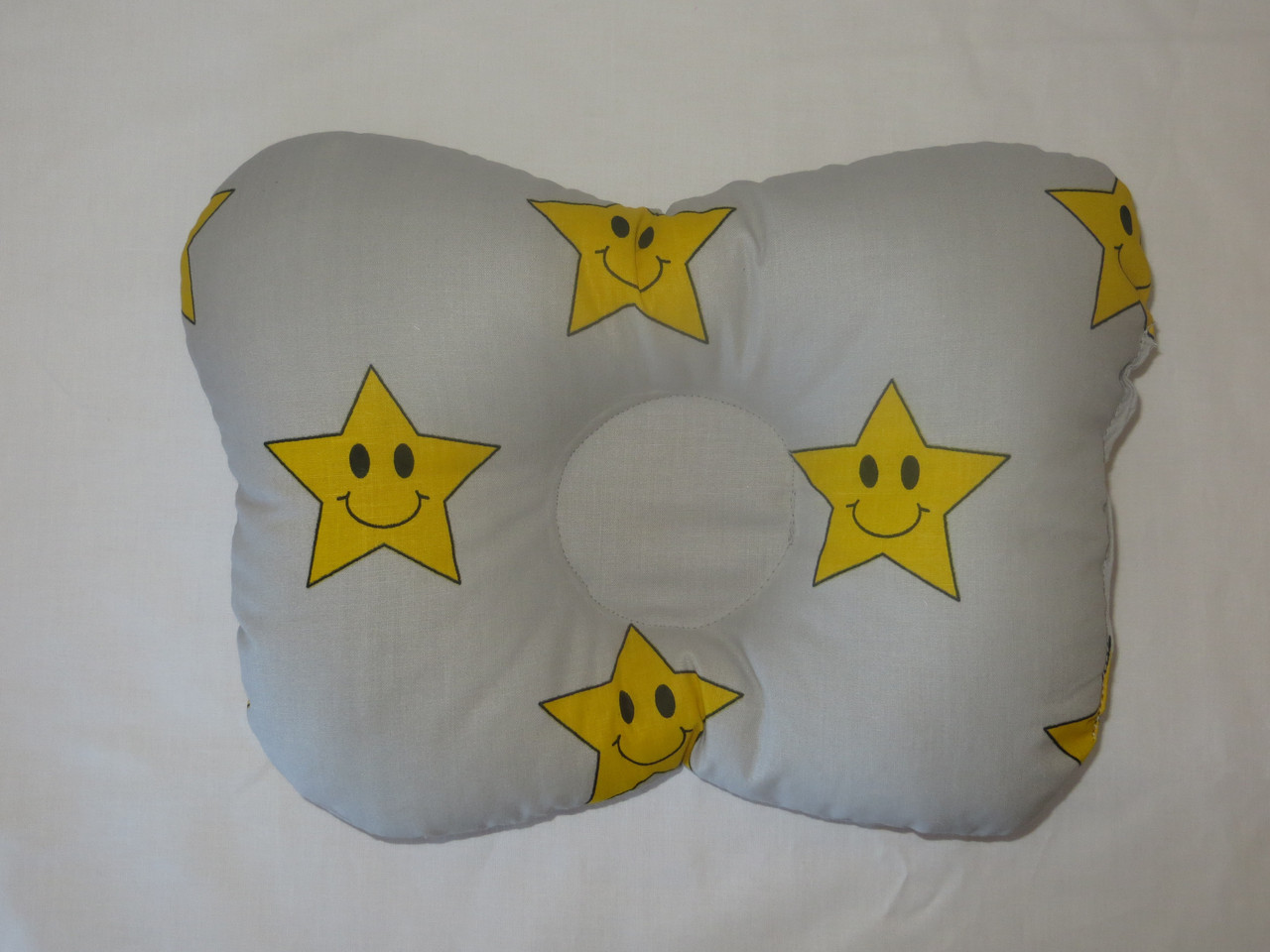 Подушка для новонароджених зірки на сірому