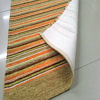 Вологостійкі килими, оранжевий килимок на кухню