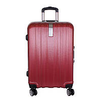Дорожний чемодан красного цвета