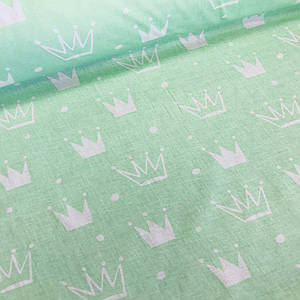 Бавовняна тканина бязь польська білі та м'ятні корони різного розміру на м'ятному (0242)