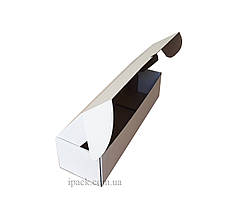 Коробка картонна самозбірна 355х105х75 мм біла мікрогофрокартон